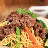Yakisoba Noodles · Stir-fried yakisoba noodles with seasonal vegetables and your choice of meat.