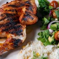 Pollo Asado · Half Chicken marinated with achiote. Served with white rice and a small house salad.