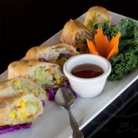 Veggie Spring Rolls (3) · Crispy fried veggie rolls filled with delicate glass noodles, cabbage, carrot, and corn. Pai...