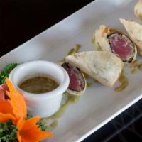Ahi Tuna Rolls (2 Rolls) (6 Pieces) 🌶 · Mild spicy. Fresh ahi tuna wrapped in thin pastry wrappers, then crisply fried and sliced fo...