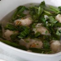 Prawn Wonton Soup · Homemade wontons stuffed with prawns and yu choy topped with green onion, cilantro, and garl...