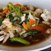 Lahd Nah · A savory Thai-style gravy stir fried with wide rice noodles, egg, garlic, broccoli crowns, C...