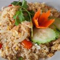 Crab Fried Rice 🌶 · Mild spicy. Traditional stir fried jasmine rice with delicious crab, egg, garlic, onion, and...