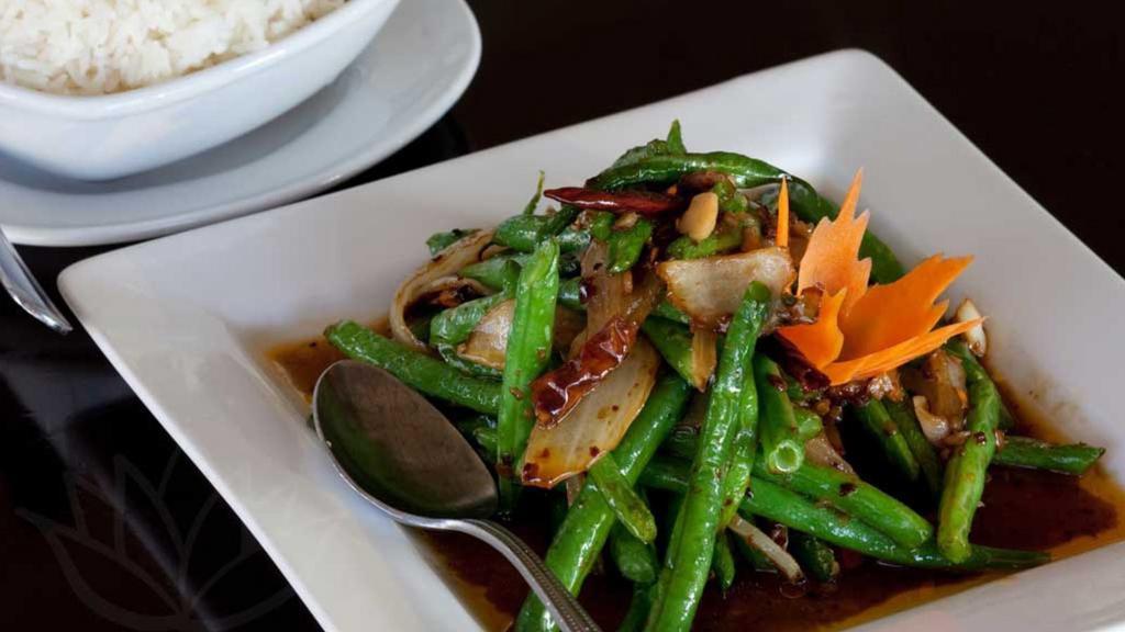 String Bean Stir-Fry 🌶🌶 · Medium spicy. Crisp, fresh green string beans stir fried with the flavors of sweet white onion, spicy chili, and garlic.