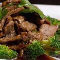 Beef Broccoli · Tender marinated flank steak with steamed broccoli and topped with our special mushroom sauce.