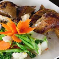 Bbq Chicken · A hearty half-chicken, marinated in our secret honey-lemongrass sauce then bbq’d to juicy pe...
