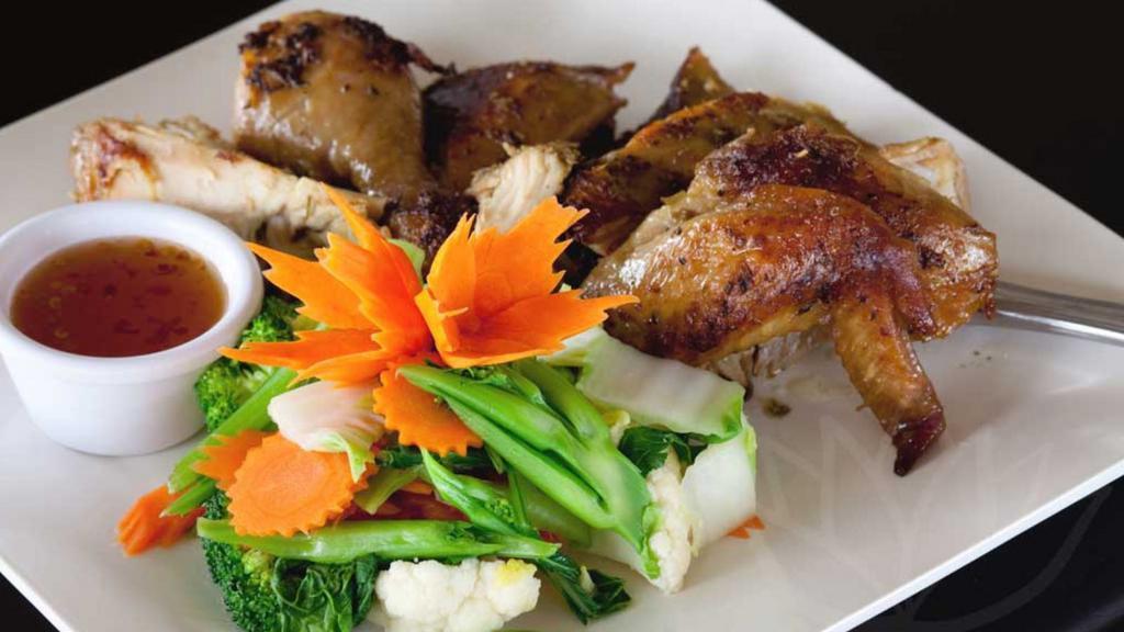 Bbq Chicken · A hearty half-chicken, marinated in our secret honey-lemongrass sauce then bbq’d to juicy perfection; served with our special sweet and sour sauce and seasonal steamed mixed vegetables.