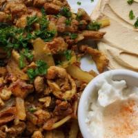 Chicken Shawarma Plate · served with toom sauce and your choice of rice, humos, or salad. Baba for a dollar more. ple...