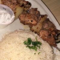 Chicken Kabob Platter · served with toom sauce and your choice of humos, salad, or rice. A dollar extra for baba. Pl...