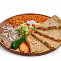 Quesadilla Plate · Quesadilla served with rice beans, sourcream, guacamole lettuce and tomatio