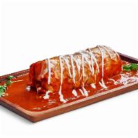 El Jefe · Burrito filled with meat, rice, beans, onions and cilantro topped with salsa ranchers, chees...