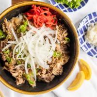 Sukiyaki Don · Sliced Beef Cooked with Onions in Sweet Dashi Soy on Rice
