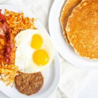 Hungry Breakfast · Two strips bacon, one sausage patty, two eggs, hashbrowns, two large pancakes.