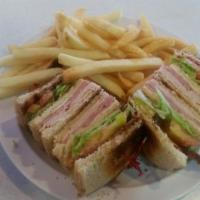 Dagwood Club · ham,turkey,cheese, bacon, lettuce,mayo and tomatoes combined in a triple decker  club sandwi...