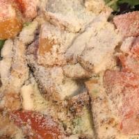Crispy Chicken · Chopped breaded chicken, romaine lettuce, green peppers, onions, carrots, tomatoes, bacon, a...
