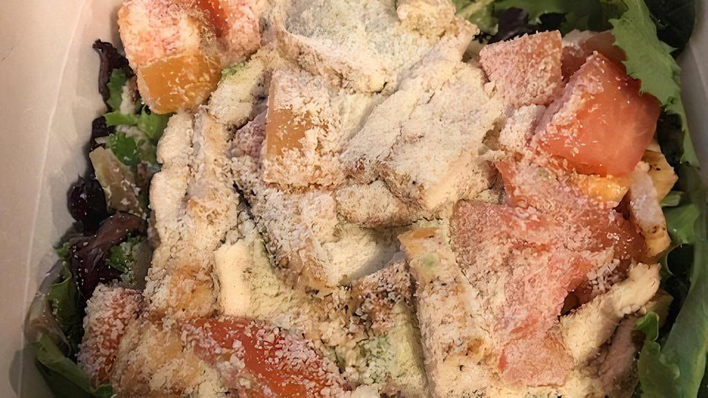 Crispy Chicken · Chopped breaded chicken, romaine lettuce, green peppers, onions, carrots, tomatoes, bacon, and hard-boiled eggs, served with honey mustard dressing.