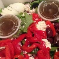 House Salad · Mixed spring greens, tomatoes, cucumbers, red onions, roasted red peppers, feta cheese, kala...