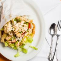 Spicy Chicken Gyro With Feta · Grilled chicken seasoned with our special Mediterranean spices with lettuce, tomatoes, pickl...