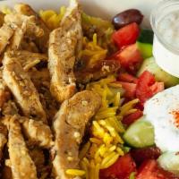 Chicken Shawarma Plate · Grilled chicken shawarma drizzled with our home made tzatziki sauce, served with a bed of ba...