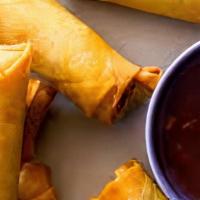 Crispy Pork Egg Rolls (4) · Crispy Pork Egg Rolls with Sweet and Sour Dipping sauce