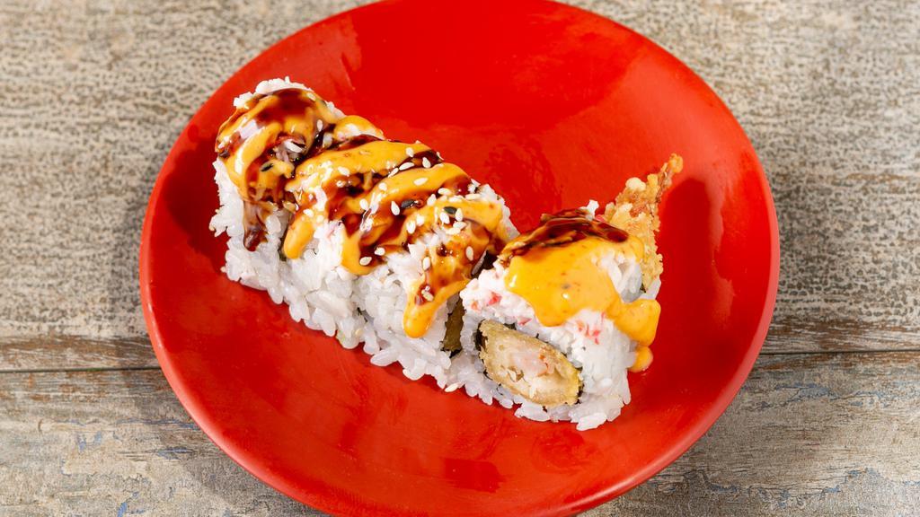 Tiger Roll · Tempura shrimp inside, crab salad, sesame seed, spicy mayo and eel sauce on top.