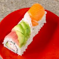Rainbow Roll · Raw. Crab salad, cucumber, avocado inside, salmon, tuna, red snapper and white tuna.