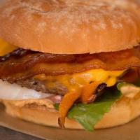Bacon Chedda Burger · Grassburger + bacon + cheddar cheese.. Served on a GMO-free potato bun with lettuce, tomato,...