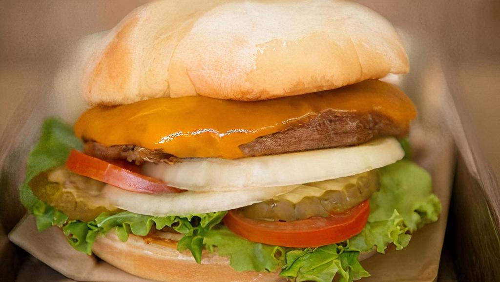 Chedda Burger · Grassburger + cheddar cheese.. Served on a GMO-free potato bun with lettuce, tomato, onion, pickles and our signature chipotle mayo.