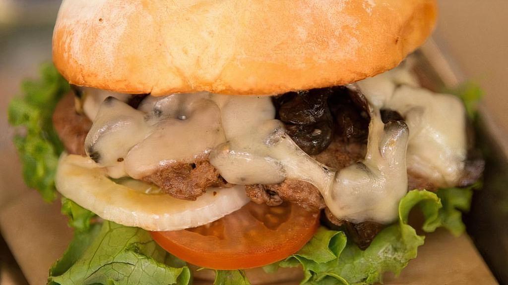 Mushroom Swiss Burger · Grassburger + sauteed mushrooms + Swiss cheese.. Served on a GMO-free potato bun with lettuce, tomato, onion, pickles and our signature chipotle mayo.