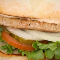 Turkey Burger · All natural turkey patty.. Served on a GMO-free potato bun with lettuce, tomato, onion, pick...