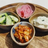Side Platter · Four different kinds of house made side dish, such as kimchi, cucumber pickle, mashed potato...