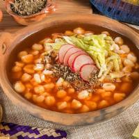 Pozole · Cabbage, white hominy, pico de gallo, chips, limones, choice of meat (chicken or pork), gree...