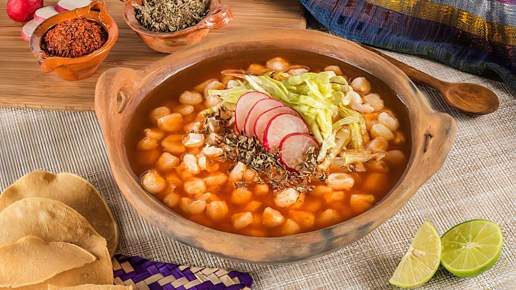 Pozole · Cabbage, white hominy, pico de gallo, chips, limones, choice of meat (chicken or pork), green only.