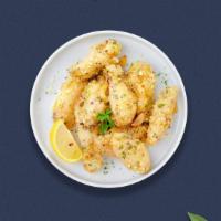 Bee'S Garlic Parm Wings · Fresh chicken wings breaded and fried until golden brown. Served with honey and garlic parme...