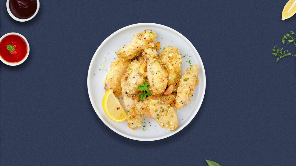 Bee'S Garlic Parm Wings · Fresh chicken wings breaded and fried until golden brown. Served with honey and garlic parmesan sauce.