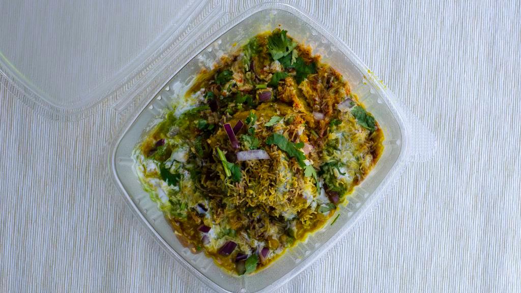 Samosa Chaat · Probably the most famous Indian snack! It consists of fried pastry stuffed with savory filling of spiced boiled.
