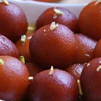 Gulabjamun · Gulab jamun is a popular Indian dessert ball made of milk solids or khoya which is first dee...