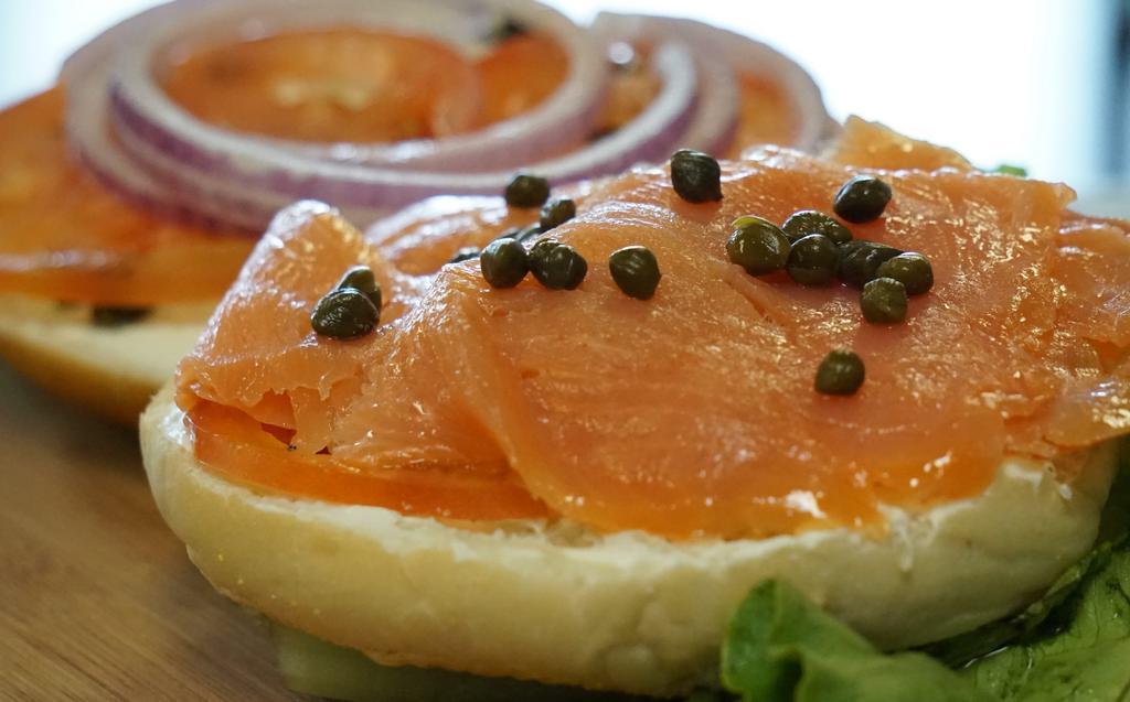 Nova Lox · Smoked salmon with plain cream cheese, tomato, and red onion on a choice of toasted bagel.
**Capers optional