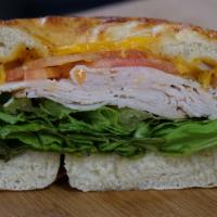 Turkey · Sliced turkey, lettuce, tomato, onion, choice of cheese, mustard, and mayo on a choice of to...