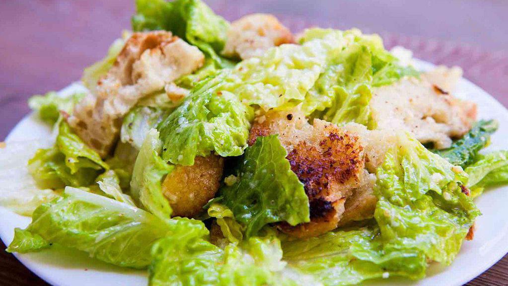 Chicken Caesar Salad · Crispy chicken, lettuce, parmesan, croutons, and Caesar dressing.