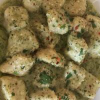 Gnocchi · Homemade Potato dumplings, with a choice of Bolognese, four cheese sauce or pesto cream sauce