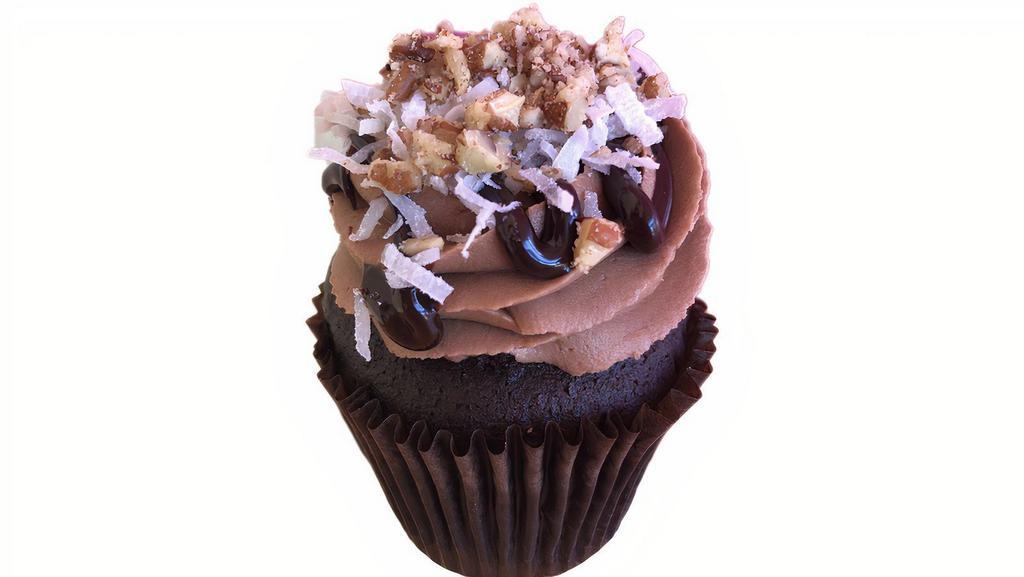 German Chocolate · Fan Favorite is here for the holidays! Rich Devils food cupcake filled with German Chocolate filling, classic Chocolate buttercream, more chocolate, sweet coconut and topped with pecans.