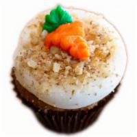 Carrot Cake · Carrot Cake, Cream Cheese Buttercream, topped with Walnuts & a buttercream carrot.