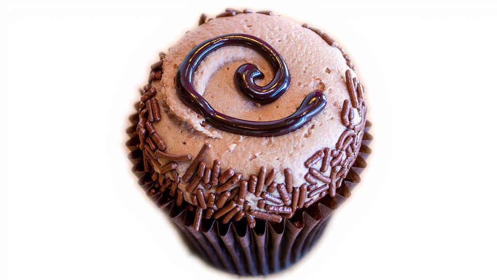 Triple Chocolate · Your troubles will melt away as you escape with this indulgent combination of chocolate cake and chocolate buttercream with Ghirardelli fudge drizzle and rolled in chocolate sprinkles.