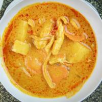 C6 Yellow Curry · A mild curry with your choice of meat with potatoes, carrot, onion simmered in creamy coconu...