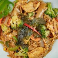 Drunken Noodles · Flat rice noodles stir-fried with egg, broccoli, onion, bell pepper, carrot, bamboo, and hot...