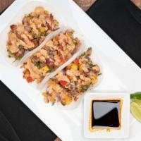 Jicama Tacos (3 Pcs) · Two fresh slices of jicama (Mexican yam) topped with mango pico de gallo and chipotle sauce.