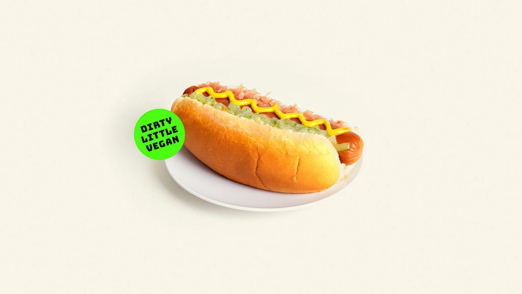 Vegan Hot Dog · Vegan hot dog with mustard and ketchup on a toasted bun.