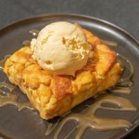 Mpe'S Old-Fashioned Bread Pudding · Served with caramel and vanilla ice cream.