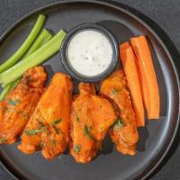 Chicken Wings (6 Pieces) · Served with carrot and celery sticks and blue cheese or ranch dressing choose your between m...